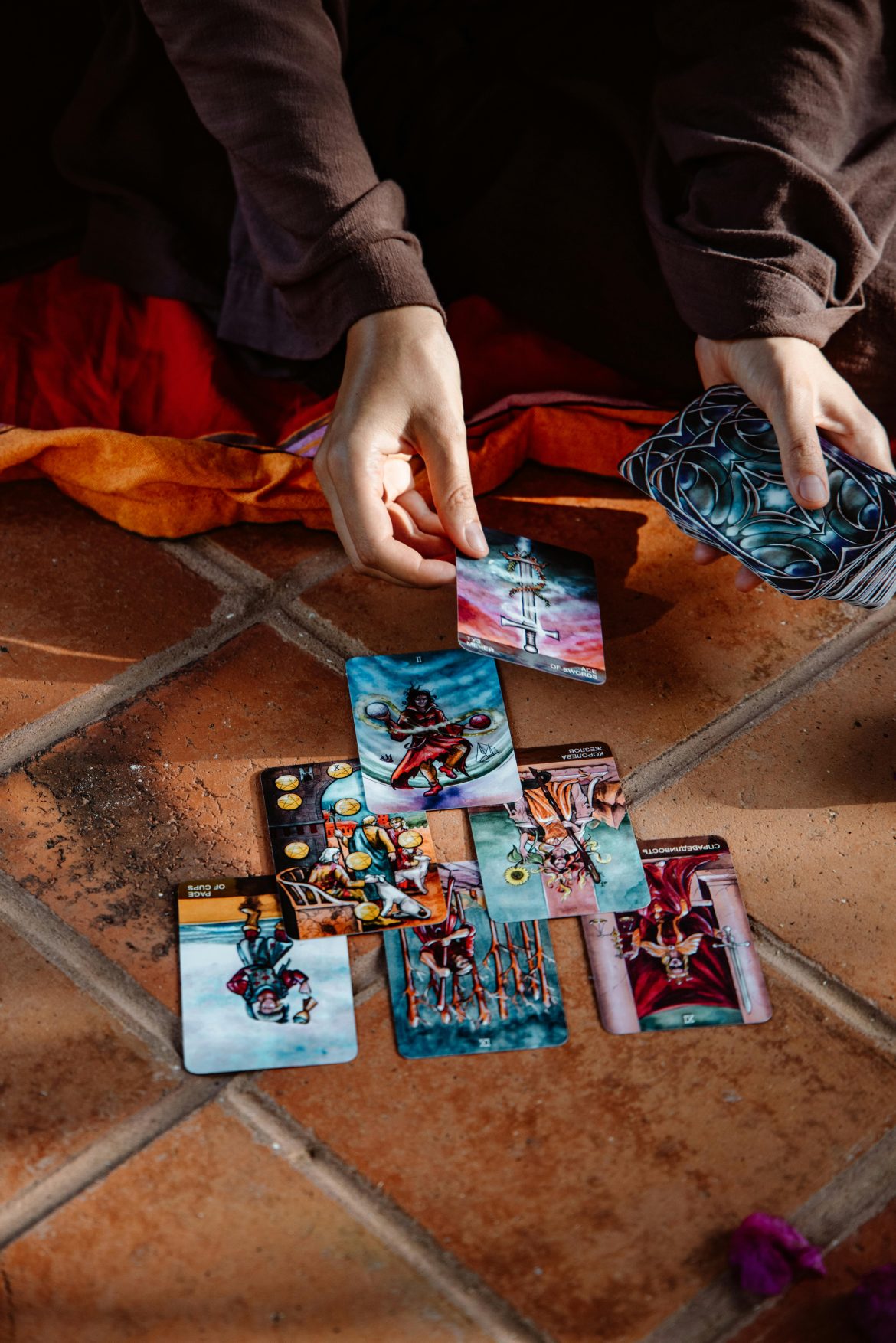 Tarot reading on terracotta floor