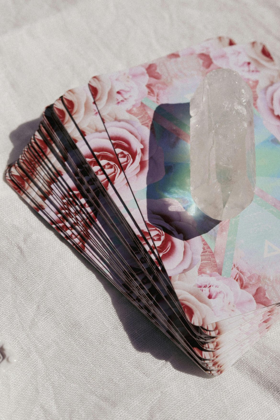 Tarot deck with clear quartz crystal